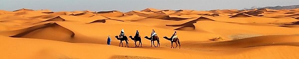 orange dunes of Erg Chebbi at Merzouga, excursions from Marrakech with pickup at the riad in the medina